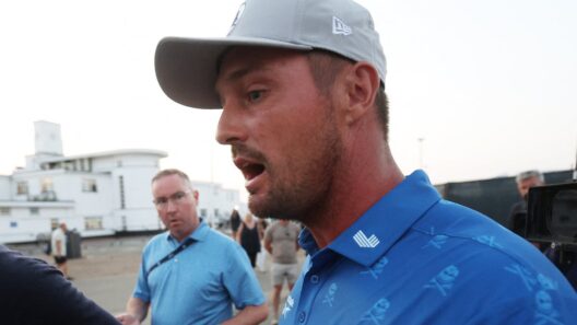 Bryson DeChambeau gets two-shot penalty at The Open as record-breakers Lucas Herbert and Sam Burns lead