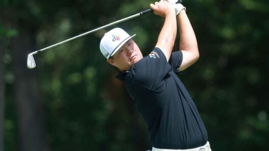 Sungjae Im is hitting an iron shot at the 11th hole of the Rocket Classic first round. Detroit=AFP Yonhap News