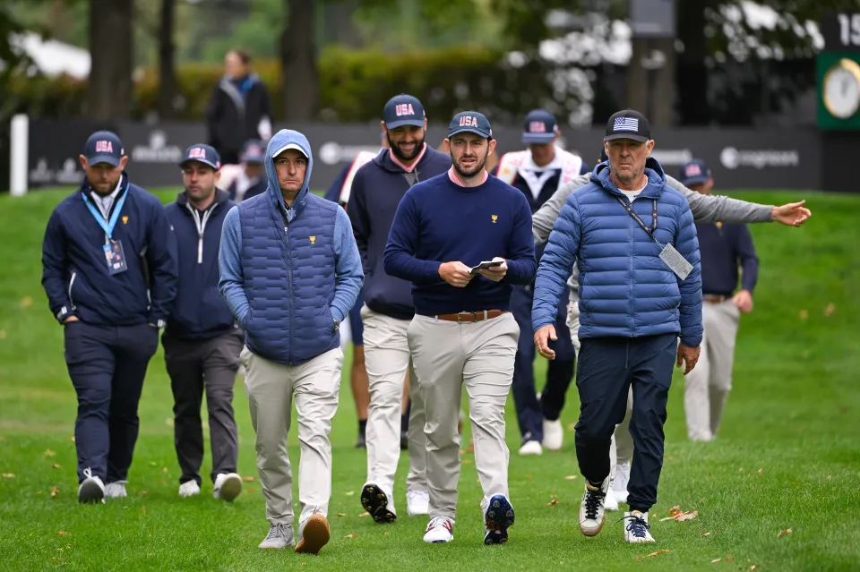 Patrick Cantlay of the U.S. Team and Kevin Kisner U.S. Team Captain's Assistant walk the 15th hole during practice prior to the 2024 Presidents Cup