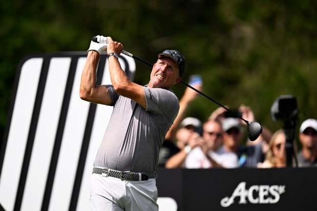 Phil Mickelson of the United States plays his shot from the 12th tee box during day one of the LIV Golf Invitational - Greenbrier at The Old White Course on Aug. 4, 2023 in White Sulphur Springs, West Virginia. (Photo by Eakin Howard/Getty Images)