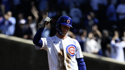 Sep 24, 2026; Chicago, Illinois, USA; Chicago Cubs center fielder Pete Crow-Armstrong (4) acknowledges the crowd after stealing second base during the first inning against the Miami Marlins at Wrigley Field. It was his 40th stolen base.