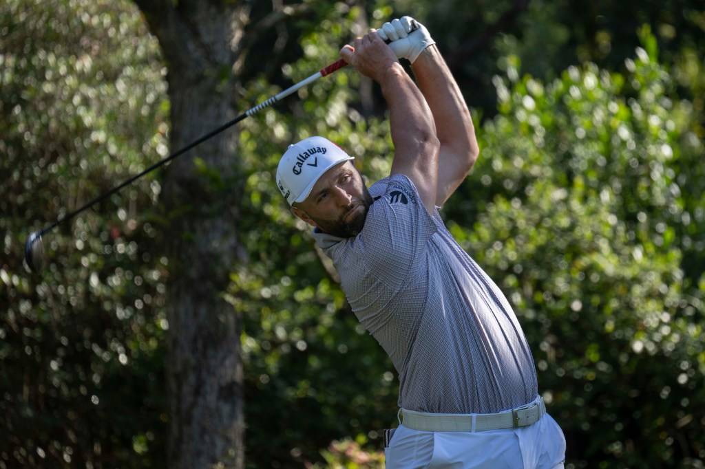 Masters champion Jon Rahm of Spain plays a stroke from the No. 2 tee during the final round of the Masters at Augusta National Golf Club, Sunday, April 12, 2026.