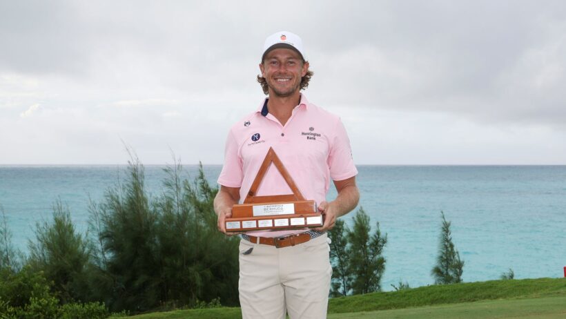Austin Smotherman poses with the Butterfield Bermuda Championship trophy