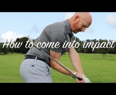 Golf swing approaching impact