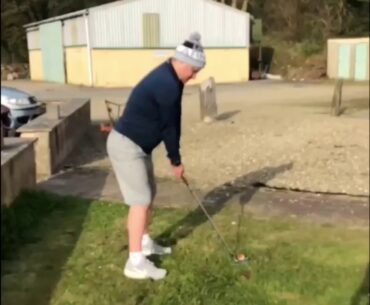 Golf swing body rotation and wrist hinge