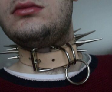 WEARING A SPIKED COLLAR