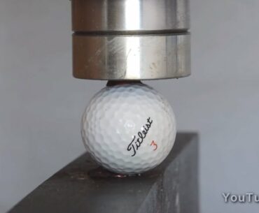 Golfballs vs Hydraulic Press - Hole in one!