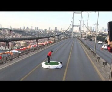 Tiger Woods drives golf ball from Asia to Europe