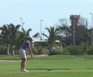 Cancun Woman Golfer Tees Off cu