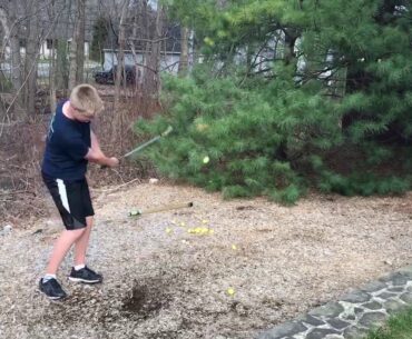 Sand wedge Flop Sht off the wood-chips