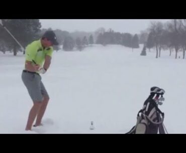 Golfer frustrated with weather decides to tee up in the snow