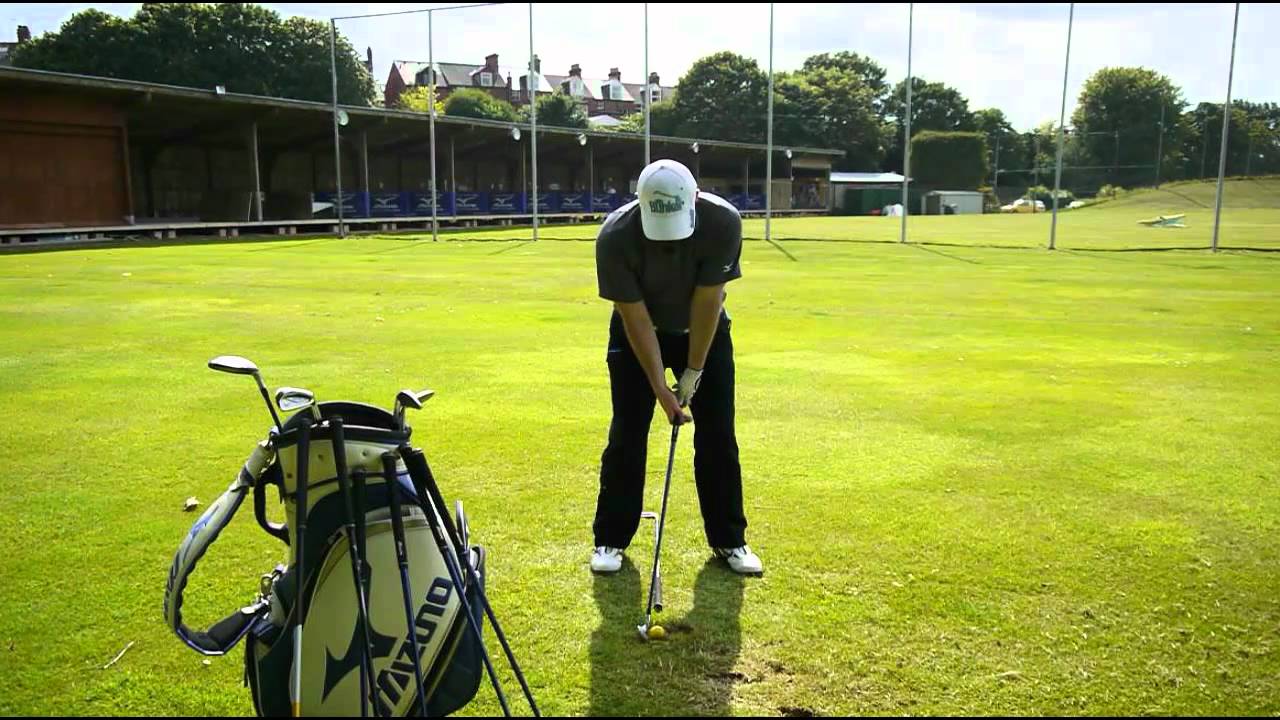 Striking The Golf Ball From the Ground and Taking a Divot Striking The Golf Ball From the Ground and Taking a Divot