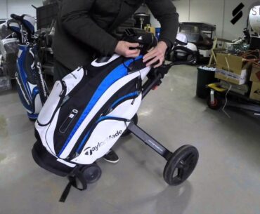 Put bag on a golf trolley