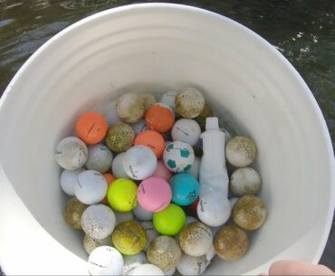 DIVING FOR MORE GOLF BALLS IN THE RIVER