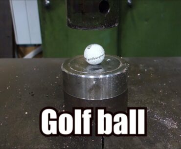 Crushing golf ball with hydraulic press