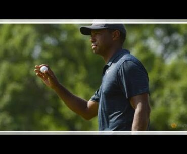 World Cup 2018 - Golf - Woods recovers from poor start to grind out a score
