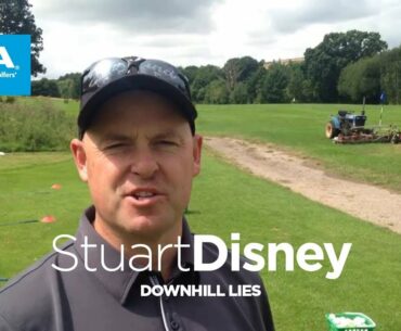 How to play from a downhill lie