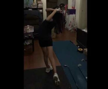 Girls can swing golf clubs at home