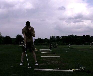 How to position the golf ball in the center of your stance