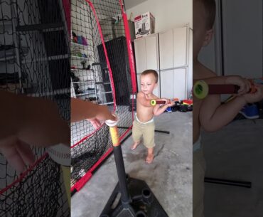 Bentley hitting off the tee at 12 ½ months old.