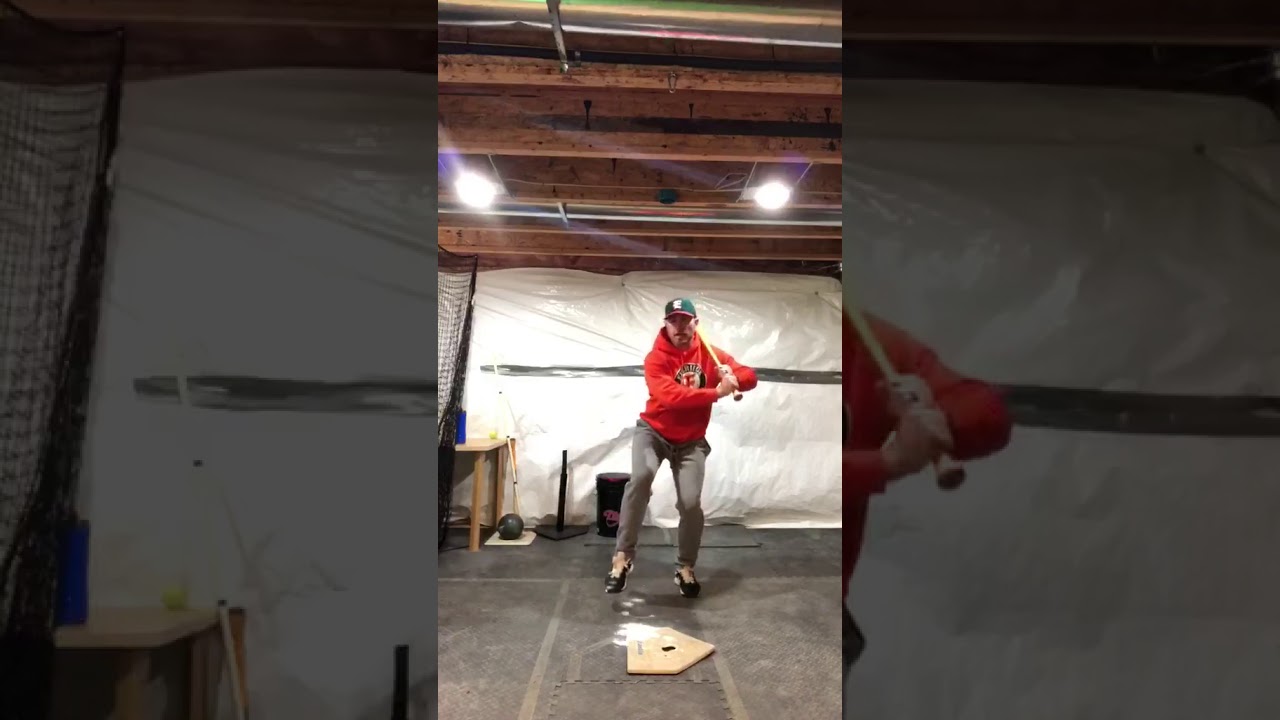 Great Tee Drill for a proper load and stride of a baseball swing Great Tee Drill for a proper load and stride of a baseball swing