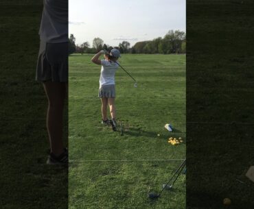 Paige Golf swing from behind