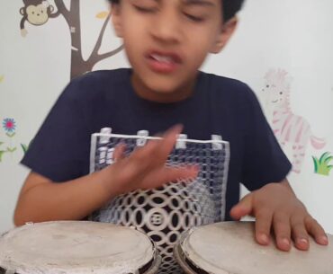 Playing Bongo by Mehul Rastogi