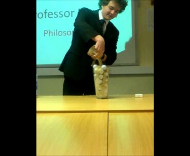 Golf balls, pebbles, sand and coke