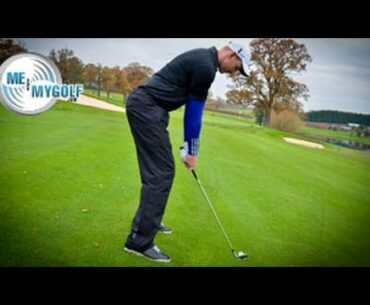 HOW TO PLAY A BALL BELOW FEET GOLF SHOT