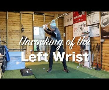 Uncocking the left wrist in golf swing