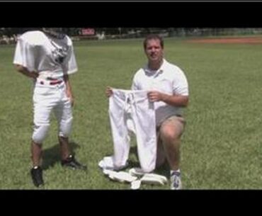 Football Tips & Equipment : How to Put on 7 Pad Football Pants