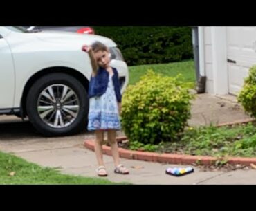 Kids golf. front yard putt putt with putter pool
