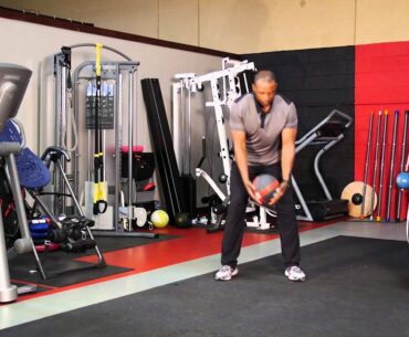 Med ball swing in golf posture