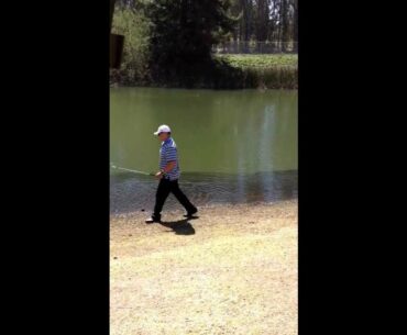 Hilarious golf shot out of water