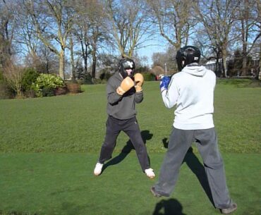 George and Sam - sparring with gloves and headguards.