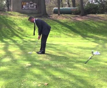 How to birdie a 109y Par 3: Using someone else's wedge, no golf glove, no golf shoes, wearing a suit