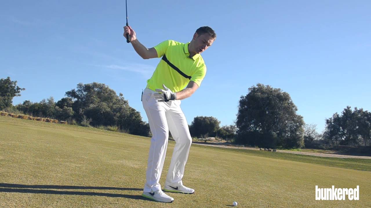 Golf Tips: How to play the ball below your feet Golf Tips: How to play the ball below your feet