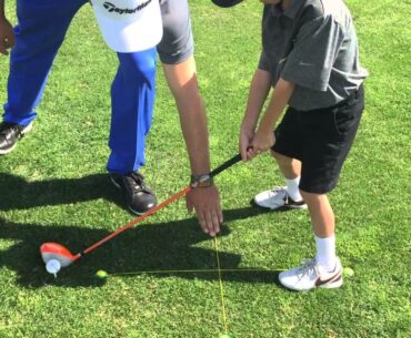 Tee Claw Training for stance and ball position on grass.