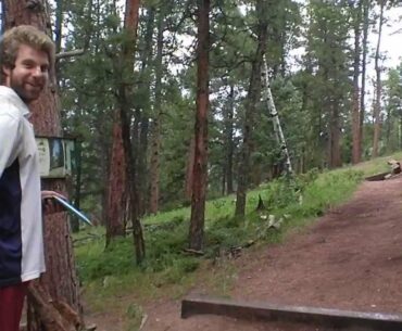 Disc Golf - Ryan K. forehand drive on Hole 12 at Beaver Ranch in Conifer, CO