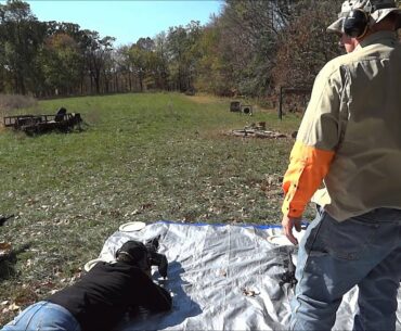 Four AR-15 Rifles with EOTechs Shooting Golf Balls at 75 Yards
