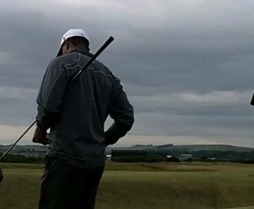 Tiger Woods plays the 12th at St Andrews British Open 2010 and signs some autographs