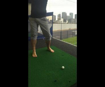 Hitting golf balls bare foot