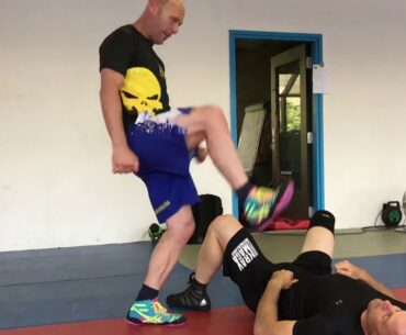 Clam defense vs jumping stomping kick, with Amnon Darsa at Expert, Institute Krav Maga Netherlands.