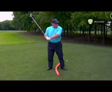 Stay in Balance at Top of the Swing