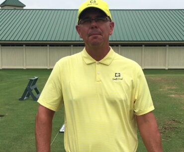 Brent Blackburn uses a sleeve of golf balls to replicate ball position.