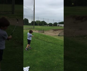 U.S. Kids Golf Ultralight 56 degree Wedge over the bunker
