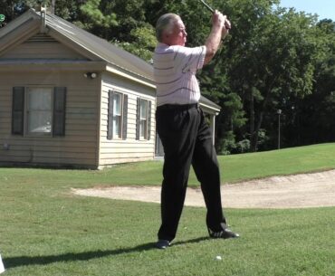 Why does an uphill lie on the golf course lose distance