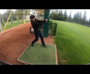 Lucster at the Victoria Driving Range first time driving golf balls in 20 years!