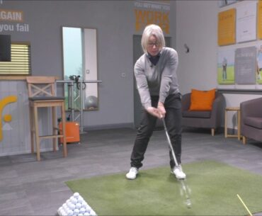 Impact fix drill to get you hitting down and creating more golf ball compression