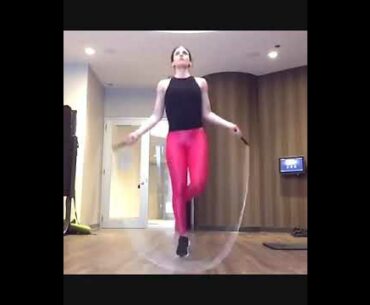 Pink Spandex Leg Day with Jump Rope
